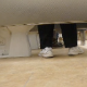 This voyeur video taken from beneath the wall of a public restroom features a girl (seen by her shoes and pants) as she uses the toilet in the adjoining stall. Audio is muffled, but she is there long enough to take a shit. About 6 minutes.